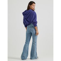 "(Previously known as Vintage Modern High Rise Seamed Flare Jean) With enough extra flare-legged fabric to dress an entire decade, our High Rise Flare Jean isn't just a '70s throwback; it's the real deal. Rekindled from patterns in our archives, this high rise creates a beautifully trimmed waistline, followed by a snug-yet-comfortable fit in the seat and thighs and a 31"" inseam length. With a wash inspired by a pair of archived bell bottoms, these look like they walked right outta Woodstock." 6 Retro Flares For Fall, Retro Fall Flares, Retro Flares With Flared Hem, Retro Cotton Flares For Fall, Retro Full-length Fall Flares, Retro Full Length Fall Flares, Retro Spring Flares, Retro Spring Flares With Flared Hem, 70s Inspired Flare Jeans For Fall