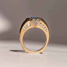 Though she's been loved before, this vintage Ceylon Sapphire ring could be yours... Materials: 14k yellow gold, Ceylon Sapphire, Diamonds Size: 7 Ceylon Sapphire Ring, Ceylon Sapphire, Diamond Sizes, Hand Engraving, Ring Bracelet, Sapphire Ring, Ring Earrings, Jewelry Shop, Necklaces Bracelets