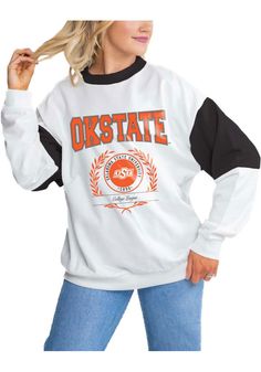 Make your way to the big game in this Oklahoma State CowboysWomens White Its a Vibe Crew Sweatshirt! This Cowboys Long Sleeve Sweatshirt features a screen print team name and seal on center chest. Stay warm and comfortable with this Womens OSU Cowboys Crew Sweatshirt. White College Style Tops With Ribbed Cuffs, Varsity Style White Top With Contrast Color, White Varsity Color Block Tops, Osu Cowboys, Quilted Sweatshirt, Gameday Couture, Oklahoma State Cowboys, Sweatshirt White, Oklahoma State