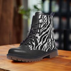 "𝐏𝐑𝐎𝐃𝐔𝐂𝐓 𝐈𝐍𝐅𝐎  * Crafted from premium quality waterproof vegan leather, durable, water-resistant. * These boots stand at approximately 6\" from the arch to the top. Additionally, the platform measures around 0.75\".  * With a tough synthetic sole to make it both comfortable and environmentally friendly. 𝐇𝐄𝐋𝐏𝐅𝐔𝐋 𝐇𝐈𝐍𝐓𝐒 𝐅𝐎𝐑 𝐏𝐔𝐑𝐂𝐇𝐀𝐒𝐈𝐍𝐆 𝐓𝐇𝐄𝐒𝐄 𝐁𝐎𝐎𝐓𝐒 𝐓𝐇𝐄𝐒𝐄 𝐁𝐎𝐎𝐓𝐒 𝐀𝐑𝐄 𝐔.𝐒. 𝐒𝐈𝐙𝐈𝐍𝐆 It's true to size, please always double-check the size in t Zebra Boots, Boots For Man, Zebra Shoes, Shoes Boot, Boot Stand, Lightweight Boots, Vegan Leather Boots, Zebra Design, Animal Print Shoes