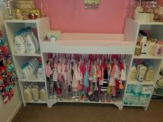 a baby changing table with lots of items on it