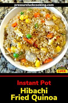 instant pot hibacchi fried quinoa with vegetables in a white bowl on a granite countertop