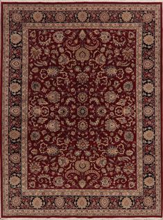 a red and black rug with an ornate design on the center, surrounded by flowers