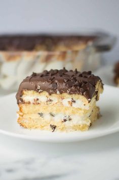 a piece of cake sitting on top of a white plate