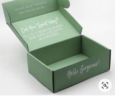 an open green box that says hello gorgeous