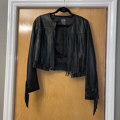 Cute 100% Genuine Leather Jacket With Western Style Fringe. This Is Such A Fun Jacket! Excellent Pre Owned Condition, Basically Like New! Iro, Anine Bing, Cowboy, Lambskin Elegant Black Fringe Outerwear, Spring Evening Biker Jacket With Long Sleeves, Black Leather Jacket With Fringe For Spring, Chic Fringed Outerwear For Night Out, Fitted Black Outerwear With Fringe, Fitted Black Fringe Outerwear, Elegant Fitted Fringe Outerwear, Fun Jacket, Marcus Black