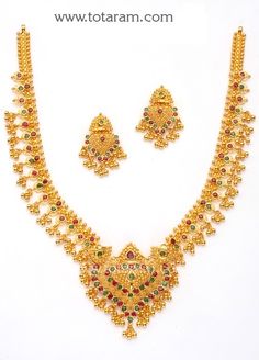 22 Karat Gold Necklace & Long Earrings set with Rubies & Emeralds and intricate workmanship. 
  Gross Gold Weight: 38.050 grams
  Ruby & Emerald Weight: 11.0 Carats
   - 235-GS726 - in 38.050 Grams for USD $3249.24. 
Made in India by Totaram Jewelers Online this product is in Gold - 22 Karat BIS Hallmark 916 KDM Gold  & is an excellent gift for Adult - Women. Ships fully insured with secured guaranteed delivery for free with your order over $250 from New Jersey USA & come Bridal Jewelry Sets Brides, 22k Gold Necklace, Gold Jhumka Earrings, Gold Jewels Design, 22k Gold Jewelry, Gold Jewelry Simple Necklace, Beautiful Gold Necklaces, Gold Necklace Simple, Gold Jewelry Stores