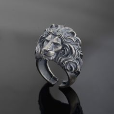 Silver 3D Lion Head Ring for men or women ring has been carefully designed and handcrafted for you, inspired by attractive winged dragons and gothic vibes of biker style. We presented our ring as white bronze (silver plated) or 925 sterling silver. This ring, which is suitable for daily use and at the same time very stylish, can be an anniversary gift or a memorial gift for your loved ones, and it will come properly packaged as a gift. As NuaSilverRings, we guarantee that we will help you with any problem. Materials : - 925 Sterling Silver - White Bronze (silver plated) Shipping Process : - Your product will be shipped within 1/4 business day. - We use the International P Shipping Service Gender : -Female / Male 3d Lion, Leo Zodiac Sign, Lion Ring, Chrismas Gifts, Head Ring, Dragon Wings, Leo Zodiac, Unisex Ring, Women Ring