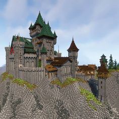 a very large castle on top of a mountain