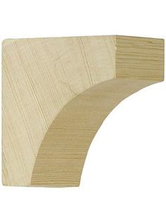 an unfinished wood shelf bracket on a white background