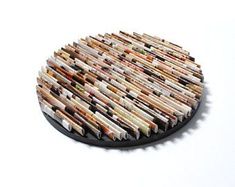 a plate made out of books sitting on top of a table