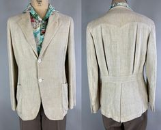 "Start a suave summer trend in this 1930's jacket! Oatmeal white heavy weight slubby linen features an incredible show on the back with a classic belt, peaked yoke, two large box pleats, and a vent. It also has notch lapels, two patch pockets, butterfly lining, inner pocket, and shell buttons. Contains an \"NRA\" label AND is dated 1935! This sport coat is in great vintage condition, with  no stains, holes or odors to note.  Please Note: We list the Suit Size in the Title. A \"Suit Size\" is tak Vintage Beige Outerwear For Summer, Vintage Beige Summer Outerwear, Vintage Spring Blazer With Welt Pockets, Spring Vintage Blazer With Flat Front, Vintage Single-breasted Linen Blazer, Vintage Linen Single-breasted Blazer, Vintage Cream Blazer For Spring, Vintage Linen Blazer With Pockets, Sartorial Men