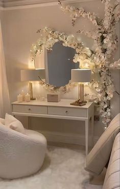 a bedroom with a bed, mirror and flowers on the wall in front of it