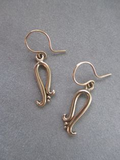 14Kt Gold Earrings by RichelleJewelry on Etsy, $660.00 Elegant Hand Forged Swirl Earrings, Elegant Swirl Shaped Hand Forged Earrings, Harrisburg Pa, Yellow Gold Earrings, Loop Earrings, Handcrafted Rings, Solid Gold Rings, Statement Pendant, Yellow Gold Earring