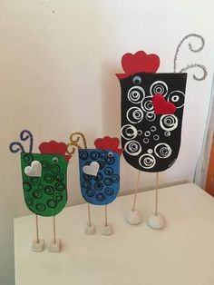 three decorative items made to look like vases