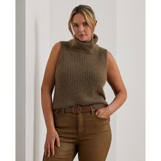 Perfect for layering this sleeveless sweater is defined by a turtleneck design a slim silhouette and a rib-knit construction. This style is realized in a wool-blend fabric with a hint of shimmer for a soft hand feel. Turtleneck Vest For Fall Layering, Fall Turtleneck Vest For Layering, Turtleneck Sweater Vest For Work In Fall, Chic Sleeveless Wool Top, Elegant Sleeveless Wool Top, Fitted Turtleneck Sweater Vest For Fall, Fitted Fine Knit Sleeveless Sweater, Fitted High Neck Sweater Vest For Fall, Fall Season High-neck Ribbed Tank Top