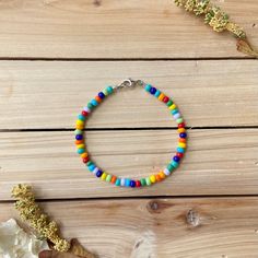 The Multicolored Bracelet is a sporadic combination of every color in the rainbow. This mismatch piece can go with just about any outfit you can think of! This high quality beaded bracelet is secured with a sterling silver lobster claw and made with glass beads that can stand the test of time, making it perfect for everyday use. Keep in mind you are looking at this piece through a screen so the colors may vary slightly. I have lots of other beautiful jewelry pieces so make sure you check those o Bracelet Trendy, Trendy Bracelet, Bohemian Style Jewelry, Beach Bracelet, Diy Collier, Anklets Boho, Trendy Bracelets, Beach Bracelets, Small Bracelets