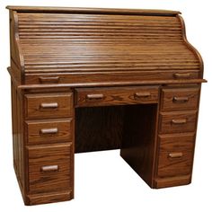 an old fashioned wooden desk with drawers