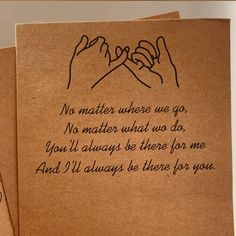 three brown cards with handwritten words on them