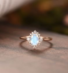 "MADE TO ORDER * Material: Solid gold(14K/18K white/yellow/rose gold) * DETAILS  57426 ✨Engagement ring - Center stone:Moonstone 5*7mm oval cut Side stone:Moissanite or diamond - diamond:0.2ct,Color G-H,Clarity SI-VS - moissanite:0.2ct * Click on the \"Pin It\" icon if you like this item * Custom Order We can make custom rings in almost any shape and style. If you want a specific model, please send us a clear picture and we will do our best.  * Shipping Most items take 2-3 weeks to create.I'm happy to rush your order, fees may apply, write me for details. * Payment Plans I offer payment plans. The minimum per payment will be $100. Write me your finger size, metal color, How much you would like to pay for the first payment. I will create a payment plan which will be customized specially for Oval Moonstone Engagement Ring, Wedding Ring Sets Vintage, Oval Halo Ring, Diamond Ring Unique, June Birthstone Ring, Engagement Rings Vintage Halo, Detailed Engagement Ring, Moonstone Engagement, Engagement Ring Vintage