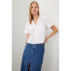 White cotton (100% Cotton). Top. Short sleeves. Collar. Front button closure. 21" from shoulder to hemline. Imported. Everyday Collared Cotton Blouse, Button-up Cotton Tops For Daywear, Everyday Cotton Collared Blouse, Everyday Cotton Blouse With Collar, Collared Cotton Blouse With Button Closure, Everyday Collared Top With Button Closure, Collared Top With Button Closure For Everyday, Cotton Blouse With Button Cuffs And Collar, Cotton Blouse With Collar And Button Cuffs