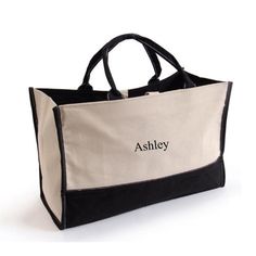 "This stylish and sturdy personalized tote bag can haul just about anything, from personal items and office supplies to your favorite puppy! Ideal for those times when a large bag is too cumbersome, this smaller lightweight tote is fashioned in black and tan and has sturdy handles for easy carrying. Embroidered first name for that personal touch! Measures 17 ½\" x 12\" x 7 ½\". Personalized with 1 line up to 6 characters in your choice of one of 20 thread colors. See photos to view thread colors Tan Tote Bag, City Tote Bag, Ems Bag, Personalized Canvas Tote, 6 Characters, Monogram Tote Bags, Thread Colors, Monogram Tote, Personalized Tote Bags