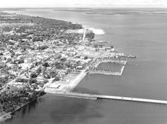 an aerial view of a city and the water