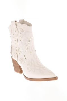 Introducing the MIA Wendi Western Booties for Women in Off White. With a sleek and stylish design, these booties add a touch of Western charm to any outfit. This pair is complete with intricate stitching, metallic accents, a sleek pointed toe, and stacked block heel. Features: MIA Shoes Style: MH2460-OFFWHT/GOLD Color: Off white Women’s booties, cowboy booties Ankle booties Western boot silhouette Anatomic contoured footbed Pointed toe Gold and stud details Stacked heel, pointed toe Measurements from size 6” Heel: 3 ½” , Shaft height: 4." Bridal Cowgirl Boots, Western Bridal Shower Outfit, Bride Cowboy Boots, Western Bridal Showers, Boot Silhouette, Western Shoes, Booties For Women, Bridal Shower Outfit, Wedding Boots