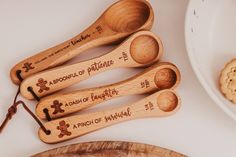 "Show your appreciation to your child's teacher with this unique kitchen gift personalized especially for her! She will enjoy baking/cooking Christmas goodies even more this year! This set of wooden measuring cups and/or spoons is sure to be a top loved gift!  Set of 4 cups: 1 cup 1/2 cup 1/3 cup 1/4 cup Set of 4 spoons: 1 Tablespoon, 1 teaspoon, 1/2 teaspoon, 1/4 teaspoon 5.5 inches long Made of Beechwood Laser engraved  Oiled with natural food grade oil that smells of lemons- Our customers are Christmas Gifts Preschool, Teacher Christmas Gifts Preschool, Cooking Christmas, Preschool Teacher Gifts, Lemon Scent, Preschool Gifts, Crinkle Paper, Baking Gifts, Custom Cups