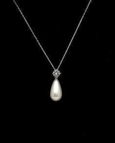 light cream teardrop high quality shell pearl drop pendant with round rhodium silver cubic bail decorated. This listing is for necklace only... Size of pendant including bail : 2.7cm x 1.1cm Matching earrings available. Please inquire. Set/bulk discounts available. Please inquire. :) Formal Bridal Pearl Drop Pendant Necklace, White Pearl Pendant Drop Necklace For Wedding, Formal Bridal Pendant Necklace With Pearl Drop, Elegant Cream Teardrop Jewelry, Classic Pearl Drop Teardrop Pendant Necklace, Wedding Drop Necklace With Pearl Charm And Teardrop Pendant, Cream Teardrop Pearl Drop Jewelry, Wedding Pearl Pendant Drop Necklace, Elegant Drop Necklace With Pearl Pendant For Wedding