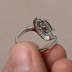 This is a gorgeous handmade creation. Its beauty is its simplicity & Elegance. The 4*6 mm pear shape faceted real London Blue Topaz is crafted in solid sterling silver and with rhodium plated. Main stone weight about 0.58 ct . cz as accents. All item is sent in a beautiful gift box If you have any idea of design your ring,pls contact me directly. You can realize more lovely stuff clicking the link https://www.etsy.com/shop/knightjewelry?refshopsection_shophome_leftnav Please leave the correc Pear-shaped Topaz Promise Ring, Fine Jewelry Blue Topaz Teardrop Rings, Elegant Topaz Teardrop Rings, Elegant Sterling Silver Pear-shaped Topaz Ring, Elegant Pear-shaped Topaz Ring In Sterling Silver, Anniversary Blue Topaz Teardrop Ring, Pear-shaped Diamond Topaz Promise Ring, Pear-shaped Topaz Promise Ring With Prong Setting, Anniversary Teardrop Blue Topaz Ring