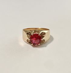 Beautiful antique 1900s Edwardian era 10k rosy yellow gold created ruby ring! This pretty antique ring is set with a created rubygemstone that weighs approximately 1.28CT. Lovely piece of early 1900s era jewelry ERA - Circa early 1900s / Edwardian Era METAL / MATERIAL - 10k rosy yellow gold, created ruby -( approximately 1.28 cts ) MARKINGS / HISTORY - marked inside the band - 10k OB (Osbty Barton) SIZE / MEASUREMENTS - Size: 9 3/4, Created Ruby measures 7 mm, Ring Head Height: 4.8 mm, Back of s Heirloom Red Gold Signet Ring, Antique Red 14k Gold Signet Ring, Vintage Solitaire Signet Ring, Antique Red Signet Ring In 14k Gold, Antique Yellow Gold Ruby Ring, Vintage 14k Gold Ruby Birthstone Ring, Antique Red Ruby Ring In 14k Gold, Antique Ruby Ring In Yellow Gold, Antique 14k Gold Ruby Ring With Birthstone