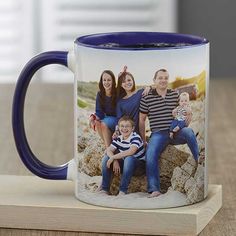 a coffee mug with a family photo on it