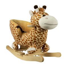 a stuffed giraffe sitting on top of a wooden rocking toy