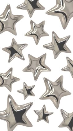 many shiny silver stars on a white background