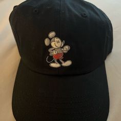 Nwt Disney Mickey And Friends Unisex Baseball Cap, 59cm Black Mickey Mouse Cap, Black Adjustable Minnie Mouse Hat, Adjustable Black Minnie Mouse Hat, Mickey Mouse Baseball Cap, One Size Fits Most, Casual Black Mickey Mouse Hat, Casual Cotton Mickey Mouse Hats, Casual Cotton Hats With Mickey Mouse Detail, Casual Mickey Mouse Baseball Cap, Adjustable Mickey Mouse Cap