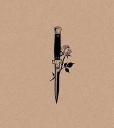 a knife with a rose attached to it