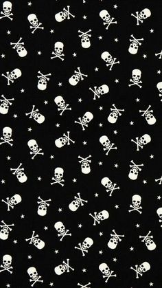 black and white skulls and stars pattern on a black background for fabric or wallpaper