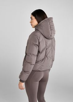 Premium quality, shower proof, soft touch matte fabric Heavy weight insulated quilting Silver colour way - fabric iridescent reflective under light Easy casual wear, all day, for multiple activities Subtle AD signature branding to front, arm & back Outer & internal pockets Taped waterproof, dual zip front fastening Removable hood Ribbed cuffs with adjustable tightening wrist straps Model is 5'8, a UK size 8 and is wearing the small. * Please note, rubber zip pulls on our jackets are not attached Women's Equestrian, Show Jackets, Matte Fabric, Equestrian Lifestyle, Riding Breeches, Shirts For Leggings, Performance Wear, Silver Colour, Vest Shirt