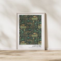 a green and gold pattern on a wall next to a white framed poster with the words gardening