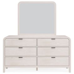 a white dresser with a large mirror on it's top and two drawers below