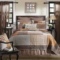 Neutral brown tones create a calming and restful respite with the Rory Queen Quilt. Featuring an irregular block layout and an outer border in black and tan chambray plaid, our 90Wx90L quilt invites you into a space with cozy color and warm design. The various greige, chocolate brown, and tan plaids with occasional patchwork in antique stripes provide a distinct, relaxed look for this all-cotton hand-quilted bedspread. The reverse side showcases textured greige chambray fabric. Color: Gray. King Quilt Bedding, California King Quilts, Lodge Bedding, Country Bedroom Decor, Country Bedding, King Quilt Sets, Vhc Brands, Luxury Quilts, Rustic Bedding