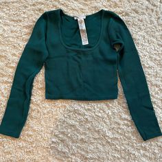 Ribbed Long Sleeve With Scoop Neck Green Color Size M/L Never Worn Great Condition Please Ask Any Questions Below! Fall Crop Top With Scoop Neck And Stretch Fit, Fall Stretch Crop Top With Scoop Neck, Fall Season Stretch Scoop Neck Crop Top, Fall Seamless Cropped Top, Seamless Tops For Fall, Seamless Long Sleeve Top For Fall, Trendy Seamless Tops For Winter, Trendy Seamless Winter Tops, Zara Cropped Crop Top For Fall