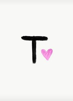 the letter t is painted with pink paint and has a heart in front of it