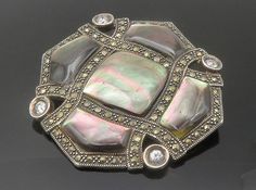 "925 Sterling Silver - Vintage Abalone Shell & Marcasite Brooch Pin - BP5494  925 Sterling Silver - Vintage Abalone Shell & Marcasite Brooch Pin - BP5494  Jewelry Type:         Brooch Pin  Metal Type:            925 Silver  Metal Size:             2.25\"  Stone Type:            Abalone & Marcasite   Condition:              N/A  Jewelry Weight:     28.4 Grams  PLEASE NOTE: THIS ITEM IS PRE-OWNED. ALTHOUGH MOST ITEMS ARE IN VERY GOOD CONDITION, SOME MAY NEED CLEANING AND/OR MINOR REPAIRS. WE MAKE A VERY STRONG EFFORT TO UPLOAD CLEAR PICTURES. PLEASE INSPECT ALL PICTURES AND ASK ALL QUESTIONS YOU MAY HAVE PRIOR TO MAKING A PURCHASE. NOT ALL STONES ARE GENUINE, SOME ARE ENHANCED OR CREATED." Antique Silver Multi-stone Brooches, Silver Multi-stone Brooches For Anniversary, Formal Silver Multi-stone Brooches, Abalone Shell, Types Of Metal, Brooch Pin, Metallic Silver, 925 Silver, Shells