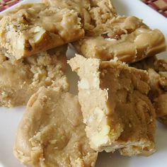 a white plate topped with cut up cookies