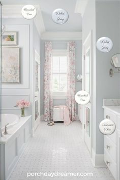 the bathroom is decorated in white and pink