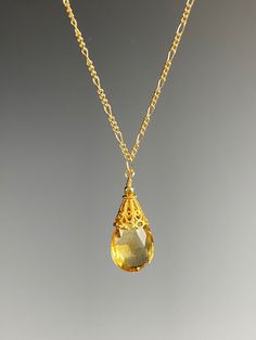 "Oh my, what a lovely and elegant Citrine gemstone! This faceted, clear, warm golden yellow Citrine pendant is a star on its own. It looks like a lovely drop of honey! A Vermeil gold cap tops the Citrine as it hangs from a Gold Fill chain. A perfect adornment with any outfit and adjustable to suit any neckline. Perfect as a gift for any occasion and the birthstone for November. Arrives in a standard gift box. FOR GIFT GIVING: ** Satin gift pouch with note card and upgraded jewelry box is also av Topaz Jewelry Yellow, Citrine Necklace Pendants, Eccentric Jewelry, Box For Gift, Chinese Clothes, Easter Jewelry, Raw Gemstone Jewelry, Gold Cap, Citrine Jewelry