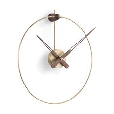 a golden clock with two hands and an hour on the face is shown in front of a white background