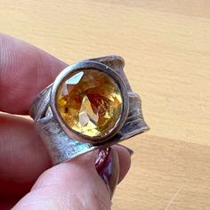 This Is An Absolutely Gorgeous, Unusual Design Vintage Ring! Wide Band,15mm Wide , Tapers Down To 10mm Wide In The Back. Sits Between Sizes 7.5 And 8 On Ring Mandrel, But Fits More Like 7.5 Due To Wide Design. The Oval Citrine Is Set In Unusual Slanted Way. Oval , Approx.13mm Long By 10mm Wide .Weights 14.18 Grams. Designer Look , Modernist Style, Truly One Of A Kind! Yellow Board, Ring Mandrel, Wide Band Ring, Chunky Rings, Wide Band Rings, Unusual Design, Vintage Designer, Vintage Ring, Wide Bands